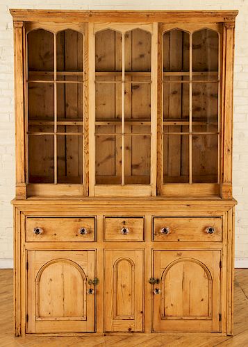 A 19TH CENTURY PINE CABINET IN