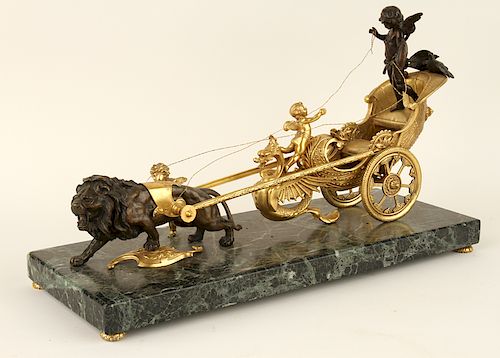 BRONZE FIGURAL GROUP OF PUTTO RIDING