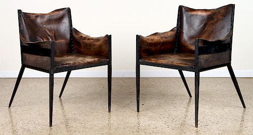 PAIR IRON LEATHER CHAIRS MANNER