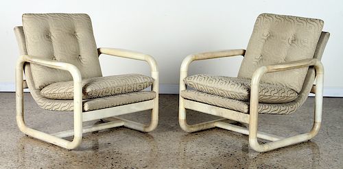 PAIR PARCHMENT COVERED UPHOLSTERED