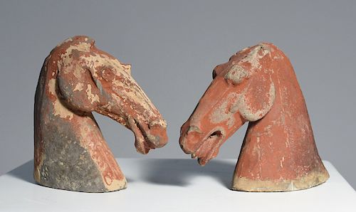 TWO HAN DYNASTY POTTERY HORSE HEADSTwo