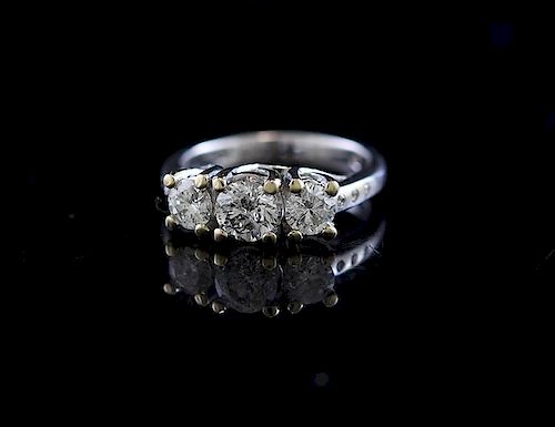 THREE STONE DIAMOND BAND SET IN