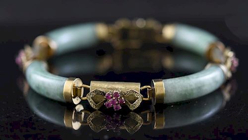 14K JADE BRACELETStamped 14k yellow