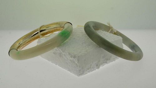 TWO JADE BANGLESTwo jade bangle 38a43b