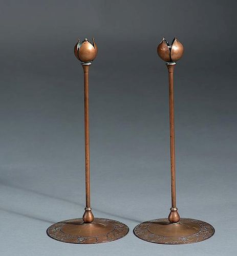PAIR OF SILVER ON BRONZE CANDLESTICKS