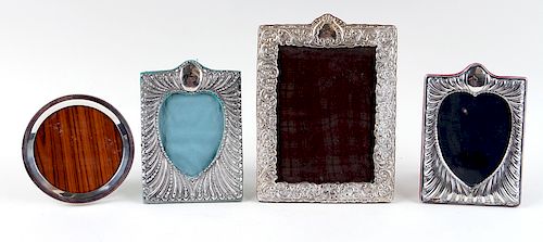 COLLECTION OF 4 STERLING FRAMESA 38a934