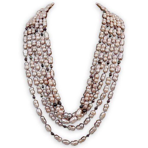 TRIPLE STRAND PEARL AND GOLD NECKLACEDESCRIPTION: