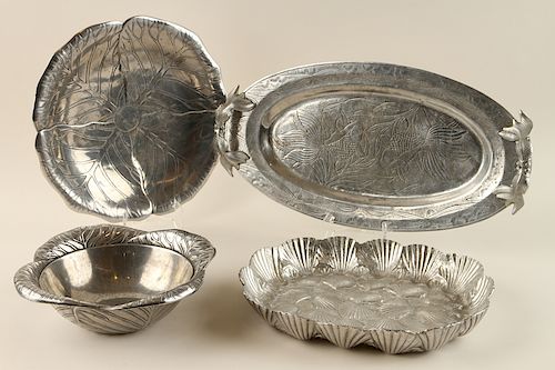 COLLECTION OF FOUR PEWTER TRAYS 38ce3c