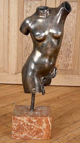 BRONZE TORSO OF A NUDE ON MARBLE