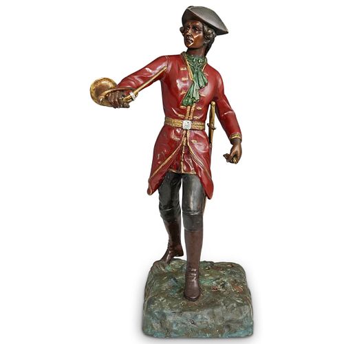 COLONIAL FIGURAL CAST METAL STATUEDESCRIPTION: