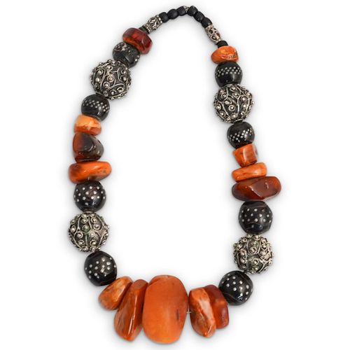 ANTIQUE TIBETAN AMBER AND SILVER