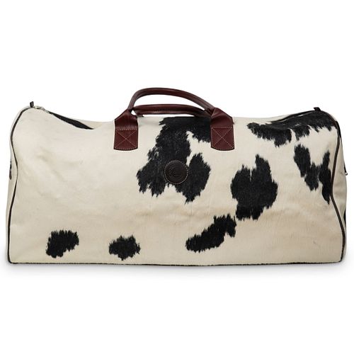 LARGE COWHIDE DUFFLE TRAVEL BAGDESCRIPTION: