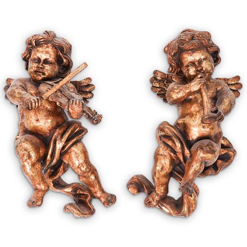 TWO ITALIAN GILT WOOD CHERUB MUSICIANSDESCRIPTION: