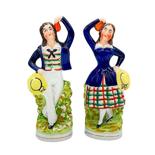 PAIR OF STAFFORDSHIRE POTTERY DANCING