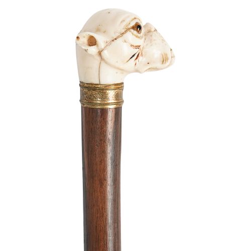 FIGURAL BONE CARVED WALKING STICKDESCRIPTION: