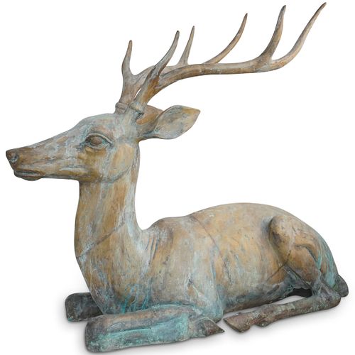 LARGE BRONZE RECLINING STAG STATUEDESCRIPTION: