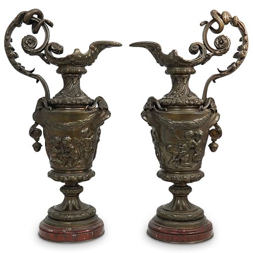 PAIR OF BRONZE FIGURAL EWERSDESCRIPTION: