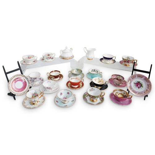 (35PC) COLLECTION OF PORCELAIN TEA CUPSDESCRIPTION: