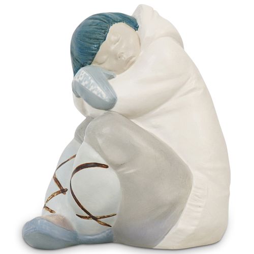 LLADRO "ESKIMO NAP" PORCELAIN STATUEDESCRIPTION: