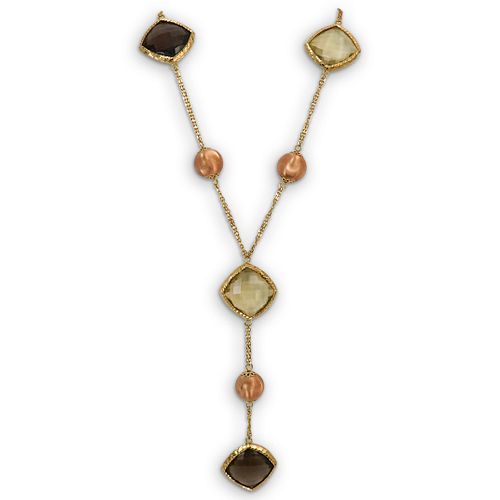 ITALIAN 18K GOLD AND TOPAZ NECKLACEDESCRIPTION: