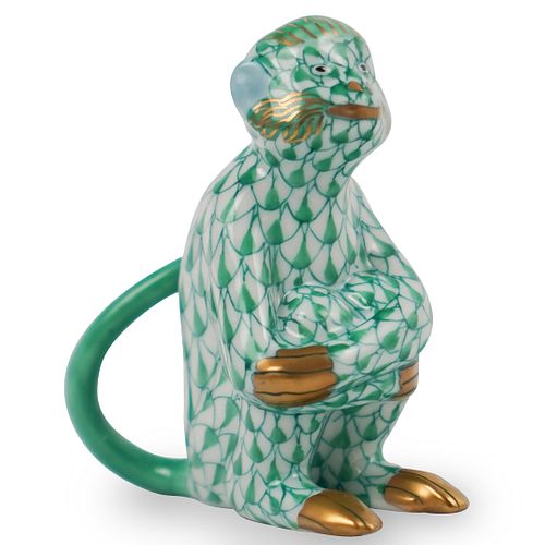 HEREND PORCELAIN FISHNET MONKEYDESCRIPTION: