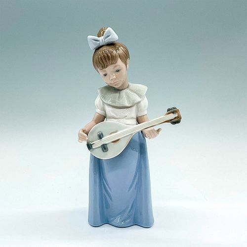 NAO BY LLADRO PORCELAIN FIGURINE,