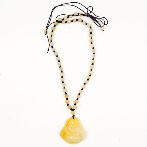 CARVED JADE BUDDHA NECKLACEDESCRIPTION:A