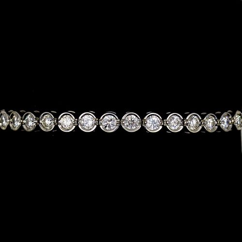 14K GOLD AND DIAMOND TENNIS BRACELETDESCRIPTION: