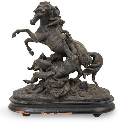 UNSIGNED MIXED METAL HORSEMAN SCULPTUREDESCRIPTION: