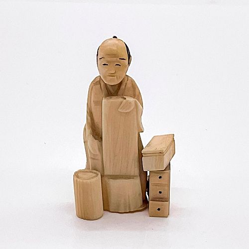 JAPANESE MINIATURE CARVED BONE FIGURINEHand