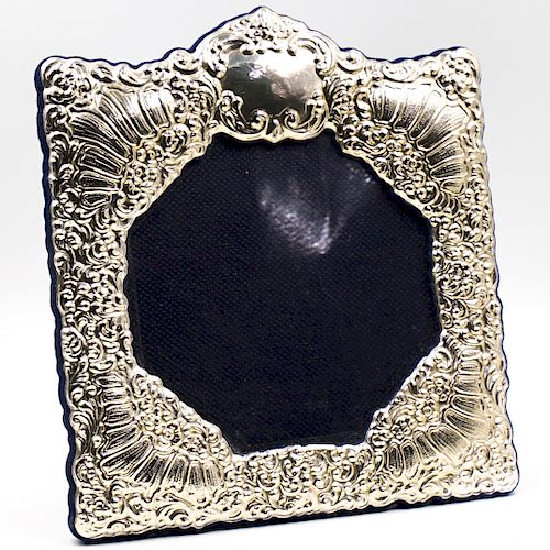 STERLING SILVER REPOUSSE FRAMEDESCRIPTION: