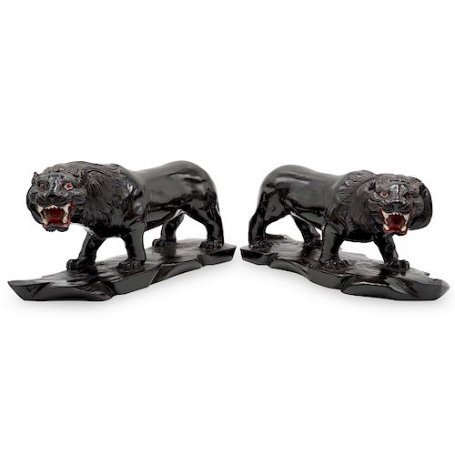 VINTAGE EBONIZED LION SCULPTURESDESCRIPTION: