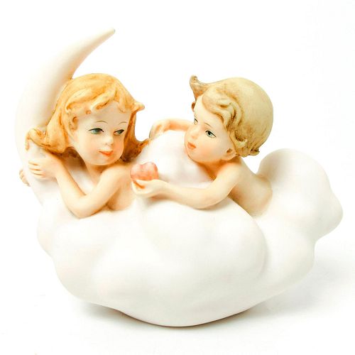 WONDERFUL WORLD PORCELAIN FIGURINE,