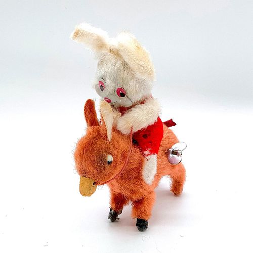 BUNNY JOCKEY WIND UP TOYDepicts 393ab3