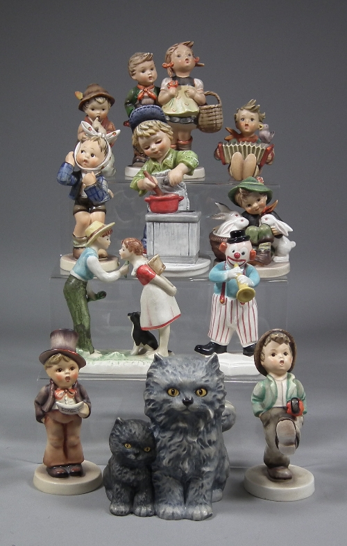 A collection of Hummel pottery figures