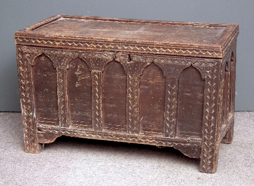 A stained and panelled pine coffer