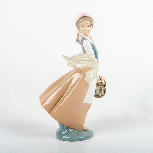 NAO BY LLADRO PORCELAIN FIGURINE,