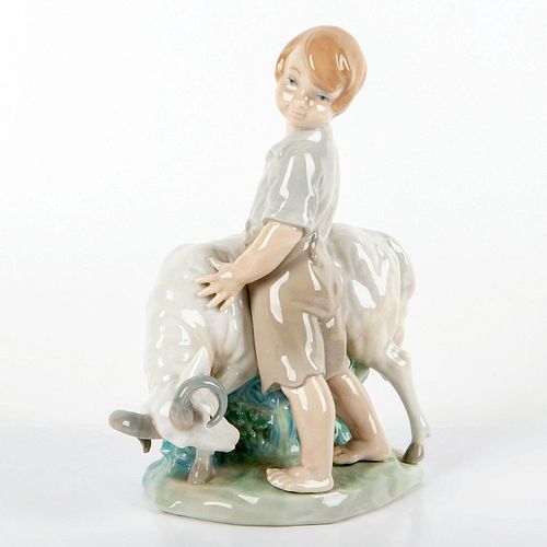 NAO BY LLADRO PORCELAIN FIGURINE, BOY