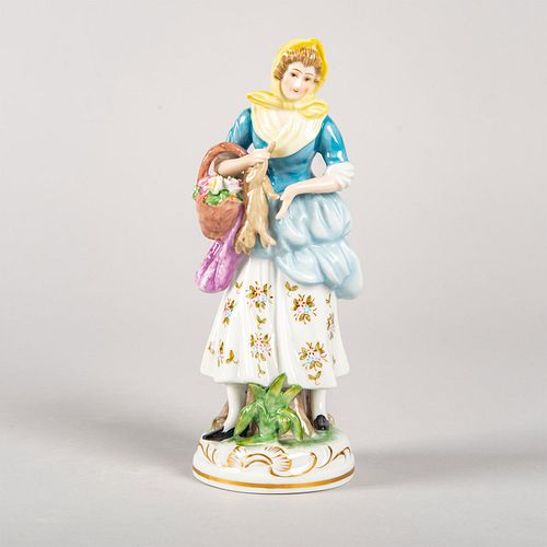 PORCELAIN FIGURINE, WOMAN WITH RABBITHand