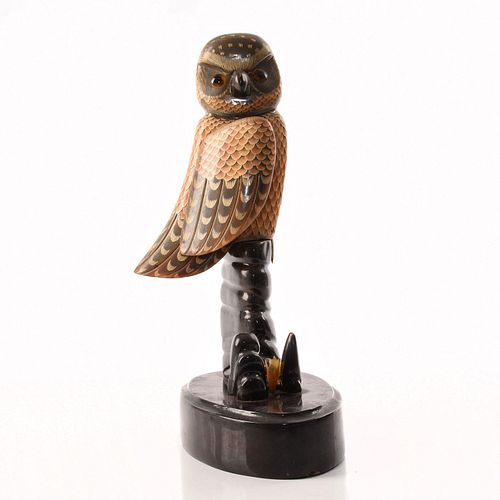 AMBER COLORED OWL SITTING ON PERCH  3998bb