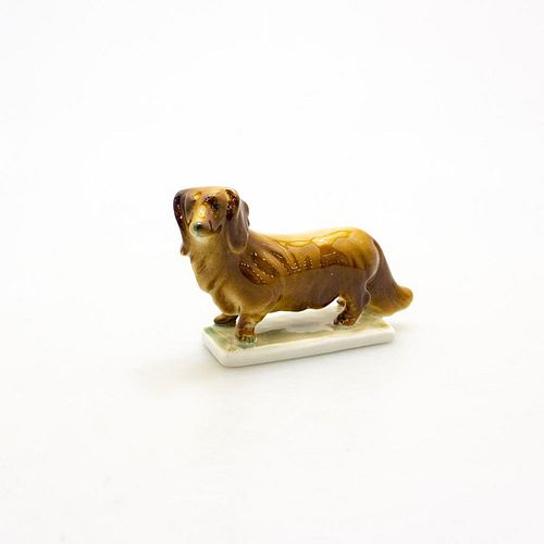 ZSOLNAY PECS PORCELAIN FIGURE, DACHSHUNDRich