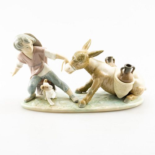 LLADRO FIGURINE BOY PULLING SUBORN