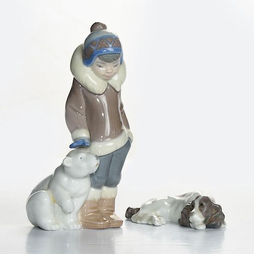 2 LLADRO FIGURINESBoy and dog in winter.