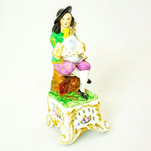 PORCELAIN FIGURINE MAN PLAYING