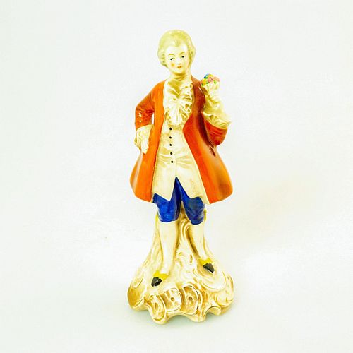 GERMAN HAND PAINTED PORCELAIN FIGURINEDepicts