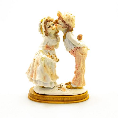 RESIN FIGURAL GROUP, BOY KISSING GIRL,