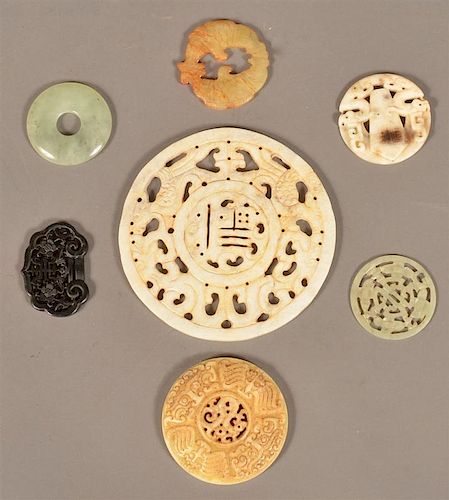 SEVEN VARIOUS JADE DISCS AND MEDALLIONS.Seven