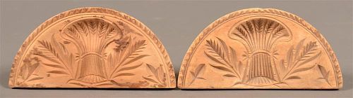 TWO CARVED SOFTWOOD HALF CIRCULAR