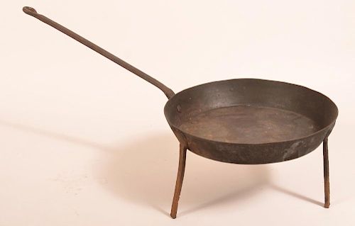 WROUGHT IRON SKILLET WITH TRIPOD BASE.19th