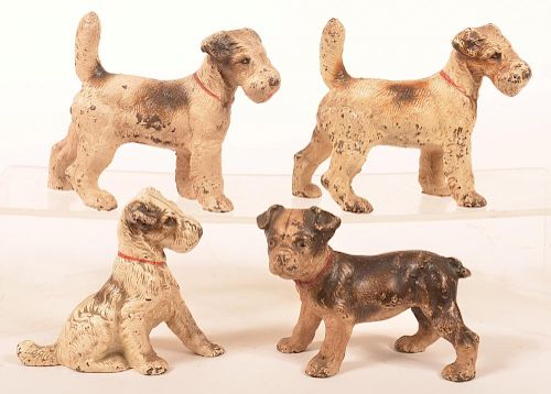 FOUR VARIOUS HUBLEY DOG FIGURES Four 39c04e